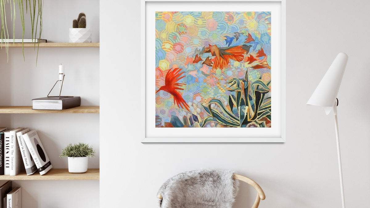 Framed Deeling art print displayed above a desk